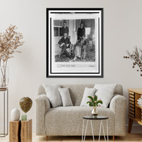 Historic Framed Print, [President and Mrs. Coolidge, full-length portraits, seated on porch, with their two sons standing behind them],  17-7/8" x 21-7/8"
