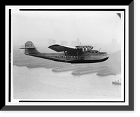 Historic Framed Print, [Aerial view of Pan American Airways China Clipper" - San Francisco piers and skyline in silhouette].Clyde H. Sunderland,  commercial and aerial photographs,  Oakland,  California.",  17-7/8" x 21-7/8"