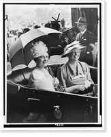 Mrs. Eleanor Roosevelt and Queen Elizabeth, holding umbrella, in automobile, leaving station for the White House, Historic Reproduction