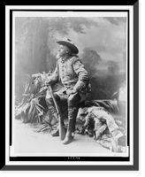 Buffalo Bill Cody, full-length portrait, seated, facing left, holding rifle, Vintage Print