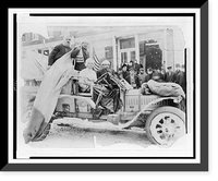 Historic Framed Print, [Four men in automobile, with American flags on snow-covered street, on the New York to San Francisco leg of the 1908 New York to Paris automobile race],  17-7/8" x 21-7/8"
