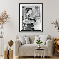 Historic Framed Print, [Gypsy Rose Lee, three-quarter length portrait, seated at typewriter, facing right].World Telegram & Sun photo by Fred Palumbo.,  17-7/8" x 21-7/8"