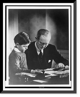 Joseph Kennedy, in his London study, helping Edward Kennedy with his studies Classic, Vintage Wall Art