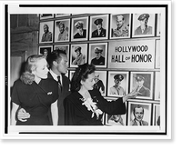 Bette Davis pointing out pictures of movie servicemen to Marlene Dietrich and Bob Hope in the Hollywood Canteen, Hollywood, California, Antique Wall Art