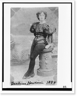 Historic Framed Print, [Beatrice Houdini, full-length portrait, facing front, leaning against pedestal, in 1894],  17-7/8" x 21-7/8"