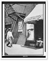 African-American man, Eddie Mitchell, approaching entrance to movie theater's colored balcony", probably in Birmingham, Alabama", Historic Print