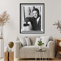 Robert Marion La Follette, Jr., half-length portrait, standing, facing left, in front of portrait of his father.Ferdinand Vogel, Washington, D.C, Vintage Wall Art