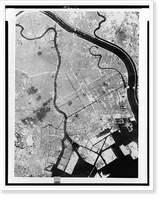 Aerial photo of Tokyo showing effects of first large-scale incendiary bombing attack by U.S. 20th Air Force operations, Historic Print