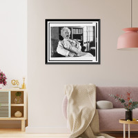 Historic Framed Print, [Samuel Langhorne Clemens, three-quarter length portrait, seated, facing slightly right, holding pipe],  17-7/8" x 21-7/8"
