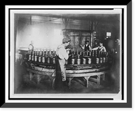 Historic Framed Print, [Boys pouring wax(?) into molds in factory],  17-7/8" x 21-7/8"