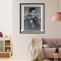 Nancy Cunard, half-length portrait, seated, facing right, wearing many bracelets, Antique Poster