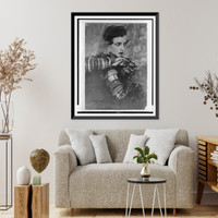 Nancy Cunard, half-length portrait, seated, facing right, wearing many bracelets, Antique Poster