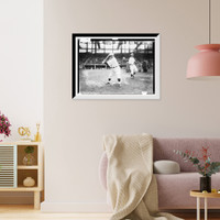 Historic Framed Print, Wilbert Robinson hitting ball in infield practice,  17-7/8" x 21-7/8"