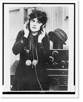 Anne Cornwall, half-length portrait, standing, facing front, listening to radio in Paramount studio, Los Angeles Classic, Antique Print