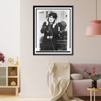 Anne Cornwall, half-length portrait, standing, facing front, listening to radio in Paramount studio, Los Angeles Classic, Antique Print