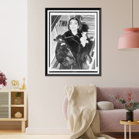 Maria Callas, three-quarter length portrait, holding dog, as she dismounts from airplane at Idlewild Airport.photo by Aviation News Pictures, Antique Print