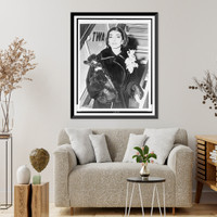 Maria Callas, three-quarter length portrait, holding dog, as she dismounts from airplane at Idlewild Airport.photo by Aviation News Pictures, Antique Print