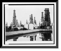 Historic Framed Print, [Oil wells including Donley well no. 1, and a Kirkpatrick well],  17-7/8" x 21-7/8"