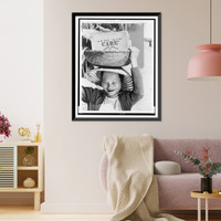 Historic Framed Print, [Vietnamese refugee woman carries basket on her head with box labeled CARE],  17-7/8" x 21-7/8"