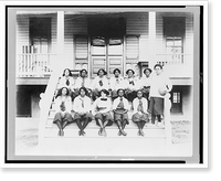 Historic Framed Print, [Student basketball players of the National Training School for Women and Girls, Washington, D.C., seated on steps for team(?) photo],  17-7/8" x 21-7/8"