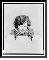 Historic Framed Print, [Miss Grace Stockman with President Andrew Jackson's dueling pistols, at the National Museum],  17-7/8" x 21-7/8"