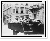 Historic Framed Print, [Man lying down on wagon seat, two women in back of wagon, Hungary],  17-7/8" x 21-7/8"