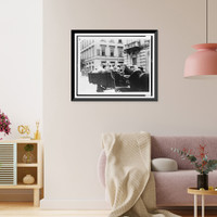 Historic Framed Print, [Man lying down on wagon seat, two women in back of wagon, Hungary],  17-7/8" x 21-7/8"