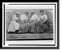 Four African American women seated on steps of building at Atlanta University, Georgia, Vintage Poster