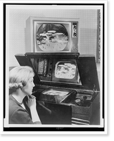 Woman looking at two television sets, showing the Official World's Fair Color Television Communications Center, Vintage Poster