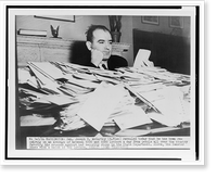 Sen. Joseph R. McCarthy sits at desk piled high with mail, Antique Wall Art