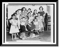 Mr. and Mrs. Lloyd Brooks, of Pittsfield, Maine, posed with their thirteen daughters, and a dog, Vintage Print