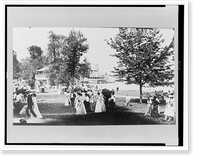 Historic Framed Print, [People socializing at Chautauqua, New York, with Lake Chautauqua in background],  17-7/8" x 21-7/8"