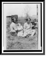 African American woman with white baby and girl, seated on grass, Kingsport, Tenn, Antique Wall Art