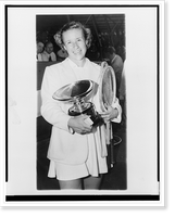 Maureen Connolly holding two tennis rackets and trophy after winning women's singles title at Forest Hills, New York, Vintage Poster