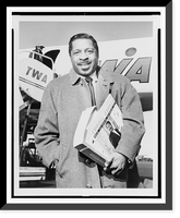 Historic Framed Print, [Erroll Garner, half-length portrait, standing before airplane].photo by Aviation News Pictures.,  17-7/8" x 21-7/8"