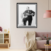 Carlos Montoya, full-length portrait facing left, with guitar.Boris Bakchy N.Y.C, Historic Reproduction