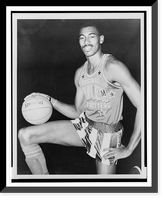 Wilt Chamberlain, three-quarter length portrait, wearing uniform of Harlem Globetrotters basketball team.World Telegram & Sun photo by Fred Palumbo, Historic Print
