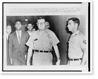 Muhammad Ali, formerly Cassius Clay, escorted from the Armed Forces examining and entrance station in Houston, Texas, after refusing induction into the Army, Vintage Poster
