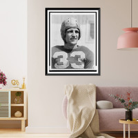 Sammy Baugh, head-and-shoulders portrait, wearing football jersey and helmet.photo by Tenschert Photo Co, Vintage Print