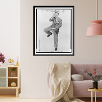 Milton Berle, full-length portrait, posed standing on one leg, with mouth wide open, Antique Poster