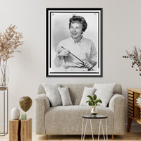 Mickey Wright, half-length portrait facing left, holding golf club, Antique Poster