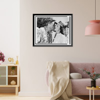 Babe Didrikson and Babe Ruth greet each other with a kiss at Coral Gables Golf Course, Antique Poster