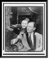 Vintage Americana Print - Young woman pouring beer into older man's (2)
