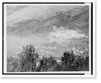 Thick clouds of smoke rising over the town of San Pietro after battle Classic, Vintage Poster