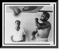 Muhammad Ali, formerly Cassius Clay, works out on light bag in Miami Classic, Vintage Print