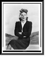 Ruth Gordon, three-quarter length portrait, sitting with arms folded.photo by Dorothy Wilding, Historic Print