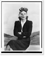 Ruth Gordon, three-quarter length portrait, sitting with arms folded.photo by Dorothy Wilding, Historic Print