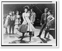 Rita Moreno singing America" with other members of the "Sharks" on movie set for the musical "West Side Story"", Vintage Print
