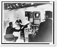 Behind the camera during filming at a CBS news desk, map of New England in background.World Journal Tribune photo by James Kavallines. Classic, Antique Wall Art