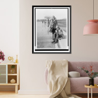 Abbey Jackson, seated, and Celene DuPuy ice skating on reflecting pool, with Lincoln Memorial in background, Antique Poster